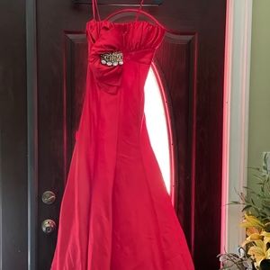 Red Strapless Gown with tiers of ruffles in Back